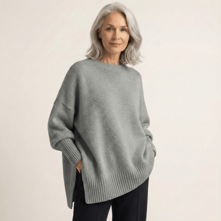 Livia I Maglione elegante con fondo asimmetrico