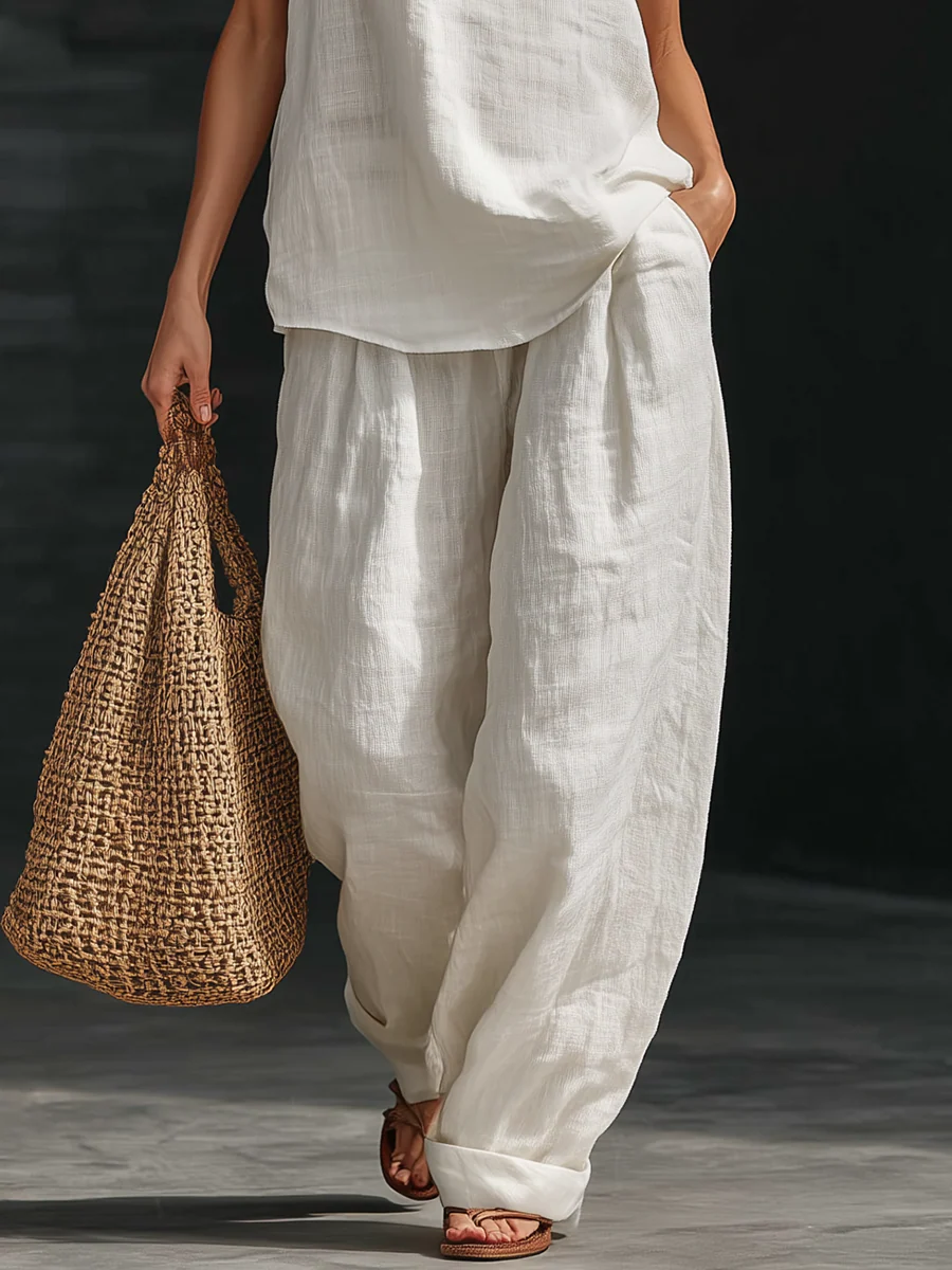 Zoe | Completo smanicato con pantalone ampio