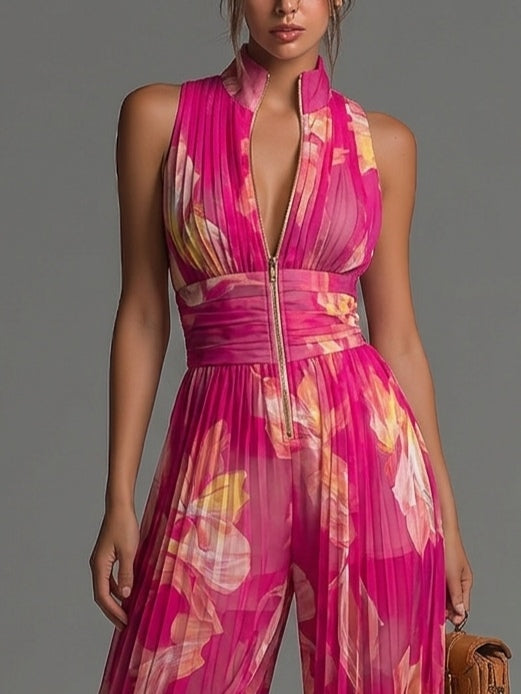 Tuta senza maniche in chiffon plissettata con zip e stampa floreale fucsia