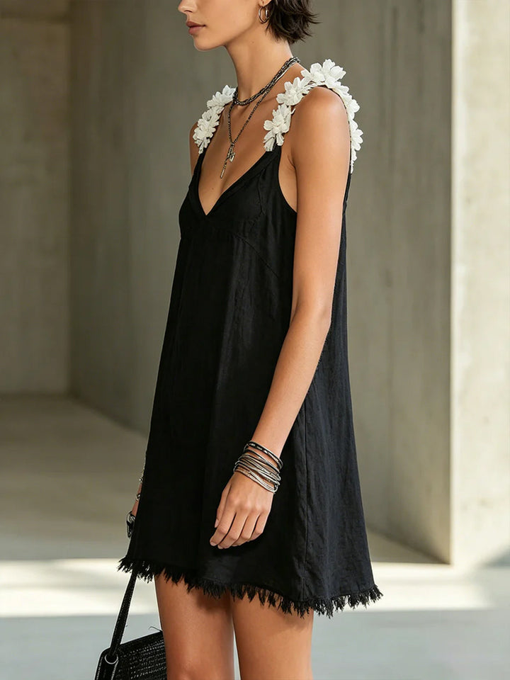 Abito mini nero con scollatura a V e spalline floreali